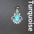 Elegant silver-toned turquoise gemstone pendant with intricate vintage floral design - Blue Turquoise