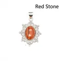 Intricate silver filigree pendant necklace featuring a natural oval red jasper stone - Red Jasper
