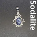 Elegant vintage silver pendant featuring an oval blue point stone and small crystals - Blue Spot Jasper