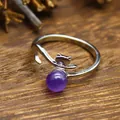 Close-up of fox-shaped silver open ring with round purple natural stone detail - Amethyst