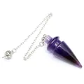 Detail shot of a conical amethyst crystal pendulum with a silver-colored chain. - Amethyst