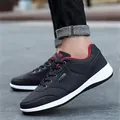 Baskets décontractées en cuir noir pour hommes avec doublure rouge et semelle blanche - 39 / Baskets / Noir