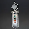 Detailed view of 7 chakra stones and Merkaba star on a clear quartz sword pendant. - White Crystal