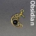 Exquisite hand-woven gold wire crescent moon pendant featuring a black obsidian bead - Moon / Black Obsidian (Gold)