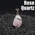 Elegant marquise-shaped rose quartz pendant with a silver-tone metal hollow wrap design. - Marquise Hollow Wire Wrapped Pendant / Rose Quartz