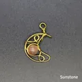 Handmade gold wire-wrapped crescent moon pendant featuring a natural sunstone bead - Moon / Sunstone (Gold)