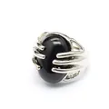 Close-up of unique vintage silver palm design ring with a large oval black natural stone - Obsidian