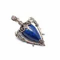Close-up of medieval retro lapis lazuli pendant with thorn frame and pentagram detail - Lapis Lazuli