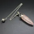 Exquisite rose quartz bullet shaped crystal pendulum pendant with a silver link chain. - Rose Quartz
