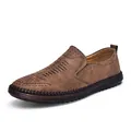 Dettaglio di mocassini in pelle marrone traspirante con design traforato e suola in gomma resistente - 38 / Stile Casual (FC2505) / Marrone