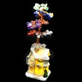 Decorative hand-woven seven chakra crystal stone tree on illuminated cottage base - Cream House