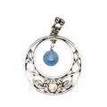 Close-up detail of vintage round stone pendant with intricate celtic knotwork and blue bead - Colorful Fluorite