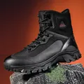 Detailed side view of black outdoor tactical hiking boot on a rugged rock surface - 39 / Black