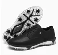 Detailed view of professional black leather golf shoes with anti-slip spiked outsole - 40 / Black