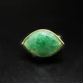 Detailed view of a marquise-cut green crystal ring in eye shape with gold setting - Green Strawberry Quartz / Adjustable Open