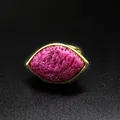 Detailed macro view of textured pink strawberry crystal in a marquise gold ring setting. - Pit-surface Ruby / Adjustable Open