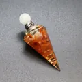 Detail shot of hexagonal cone resin pendant with tourmaline stones and copper coil. - Red Agate-Silver