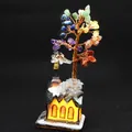 Close-up of a handmade chakra crystal money tree with an illuminated church model base - Church Architecture