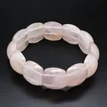 Close-up view of a natural translucent rose quartz hand plate bracelet on black background - Flat Rectangular Style (aljylp1860) / 18cm Length (21x11mm Stone) / Rose Quartz