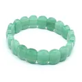 Macro view of a green natural stone faceted bracelet showing polished rectangular bead texture. - Aventurine Jade