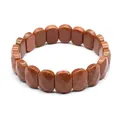Detailed shot of brown goldstone faceted stretch bracelet with shimmering gold specks - Gold Sandstone
