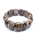 Close-up of natural Rhodonite stone bracelet with pink and black dendritic patterns. - Flat Rectangular Style (aljylp1860) / 18cm Length (21x11mm Stone) / Rhodonite