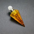 Detail view of a hexagonal conical resin pendant with yellow tourmaline chips inside. - Yellow Citrine-Silver Tone