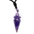 Detailed macro view of a cone-shaped purple amethyst crystal pendant with black cord - Amethyst