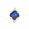 Macro view of blue faceted natural stone pendant with 18K gold plated clover frame - Lapis Lazuli