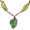 Detailed macro view of Bohemian green fluorite raw stone necklace with peridot chip accents. - Hand-Woven Net Pouch / Green Fluorite