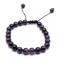 Close-up of 8mm amethyst stone bead bracelet with adjustable handmade braided cord - Amethyst