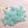Set of glow-in-the-dark 3D plastic star stickers for wall decoration in light green finish - Blue 100 Pieces