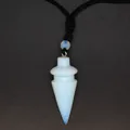 Close-up of a conical opalite crystal pendant with black braided cord necklace - Opal