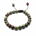 Detailed view of handmade 8mm natural stone beaded bracelet with adjustable cord - Dragon Blood Stone