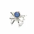 Detailed close-up of a silver spider open ring featuring a round blue kyanite stone - Open Ring / Blue Goldstone