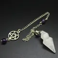 Detailed shot of a hexagonal crystal pendulum with pentagram charm and amethyst beads. - White Crystal