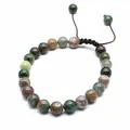 Detailed macro view of 8mm natural moss agate beads on an adjustable brown cord - India Agate
