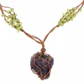 Handmade woven net necklace with raw purple fluorite pendant and peridot stone chips - Hand-Woven Net Pouch / Amethyst