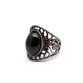 Close-up view of vintage hollow filigree ring with oval black agate in antique bronze - Obsidian