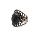 Macro detail of a vintage filigree ring with antique copper finish and black lava stone. - Lava Stone