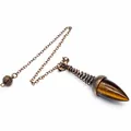 Macro view of Tiger's Eye conical dowsing pendulum with vintage copper chain and spring detail - Tiger Eye (Antique Bronze)