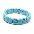 Detailed view of rectangle blue turquoise matrix stone beads on a stretch bracelet - Faceted Panel Style / Turquoise