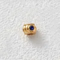 Close-up of gold-plated stainless steel bead with inlaid blue zircon for DIY jewelry - Drum Shaped Bead (Z1-5) / Gold with Blue Zircon
