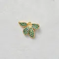 Detailed macro view of a gold-plated flower pendant with inlaid teal cubic zirconia stones - Pendant Only (Without Chain) / Lake Blue Flower Style (D169-3)