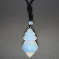 Close-up of a translucent opalite conical gemstone pendant with a black braided cord - Opal