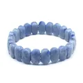 Detail showing the faceted blue natural stone beads of this elegant hand-row bracelet. - Blue Aventurine