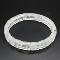 Detail shot of a minimalist square-cut clear crystal bracelet with natural texture - White Crystal