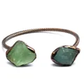 Macro view of retro twisted metal cuff bracelet featuring two natural green crystal stones. - Green Fluorite