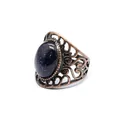 Macro detail of a medieval style hollow ring with a sparkling blue sandstone gem - Blue Sandstone