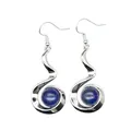 Detail view of silver spiral drop earrings featuring blue round natural stone beads - Lapis Lazuli